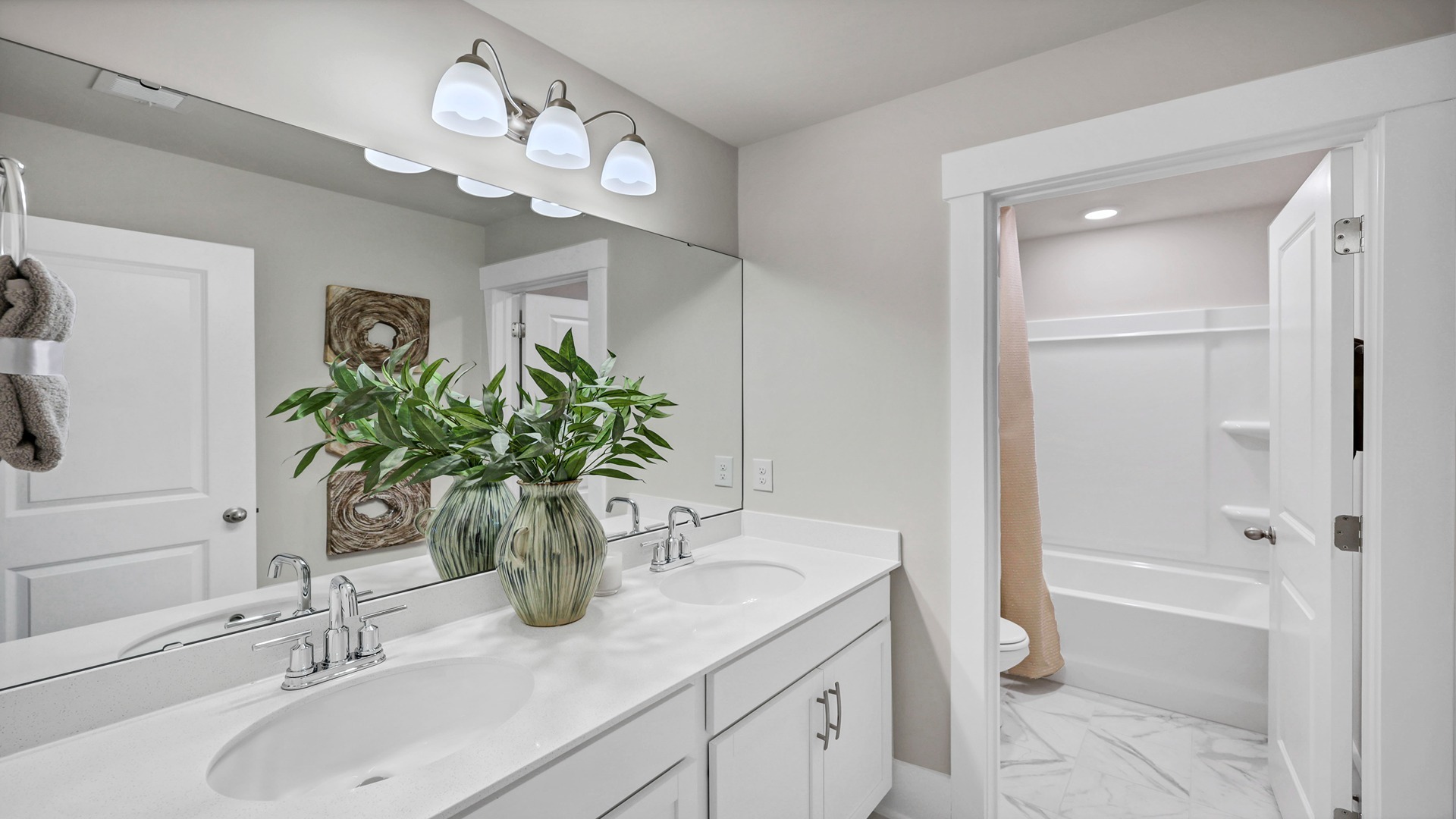 Bathroom upstairs with double vanity