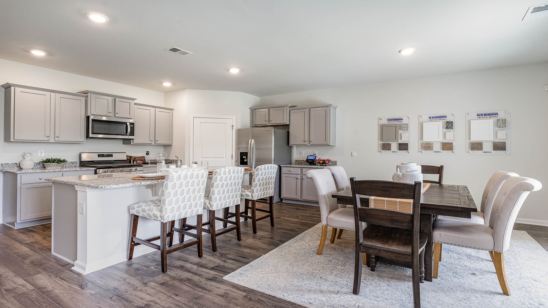 Open concept dining and kitchen areas