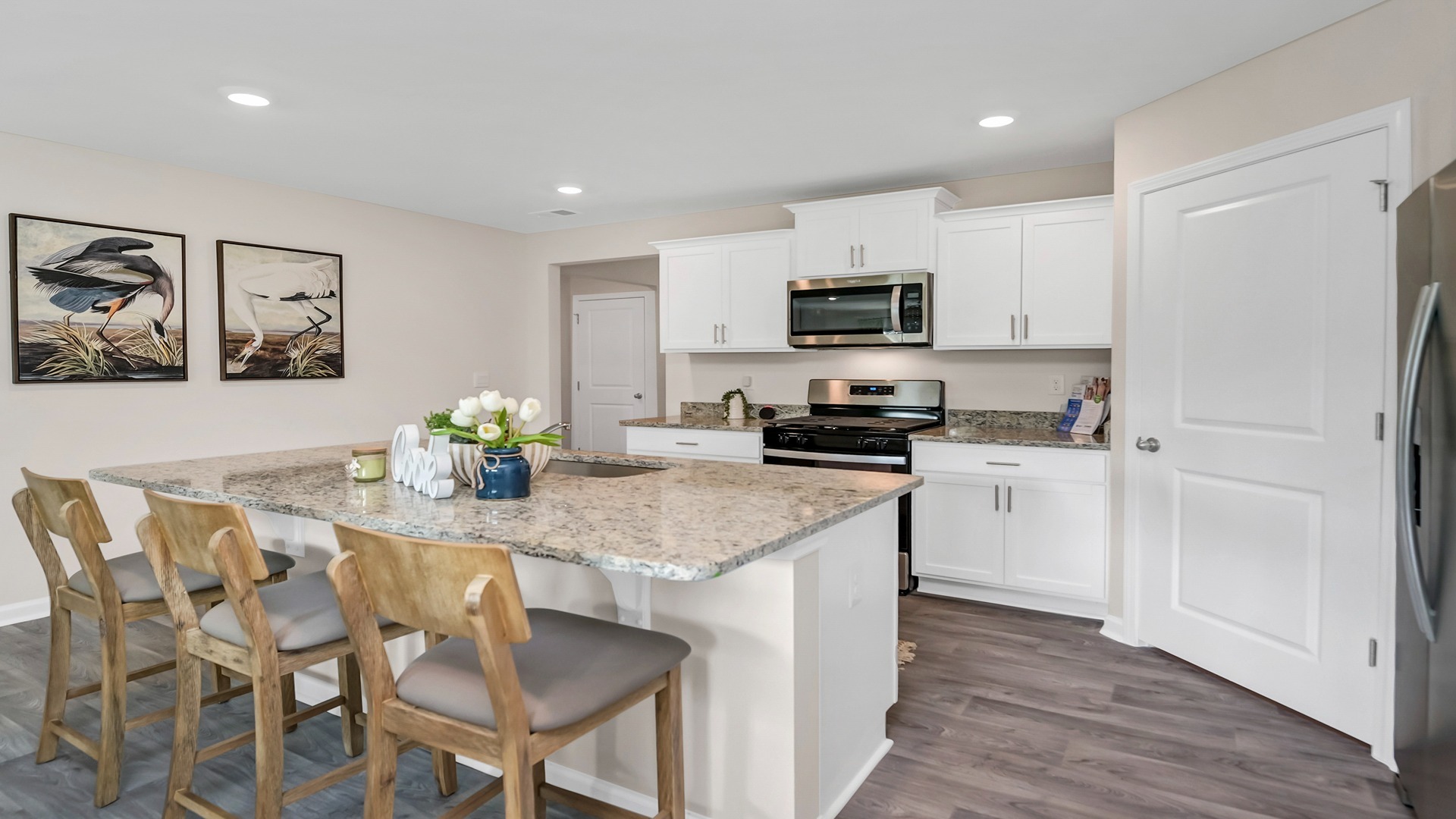 Barstool seating at floating kitchen island