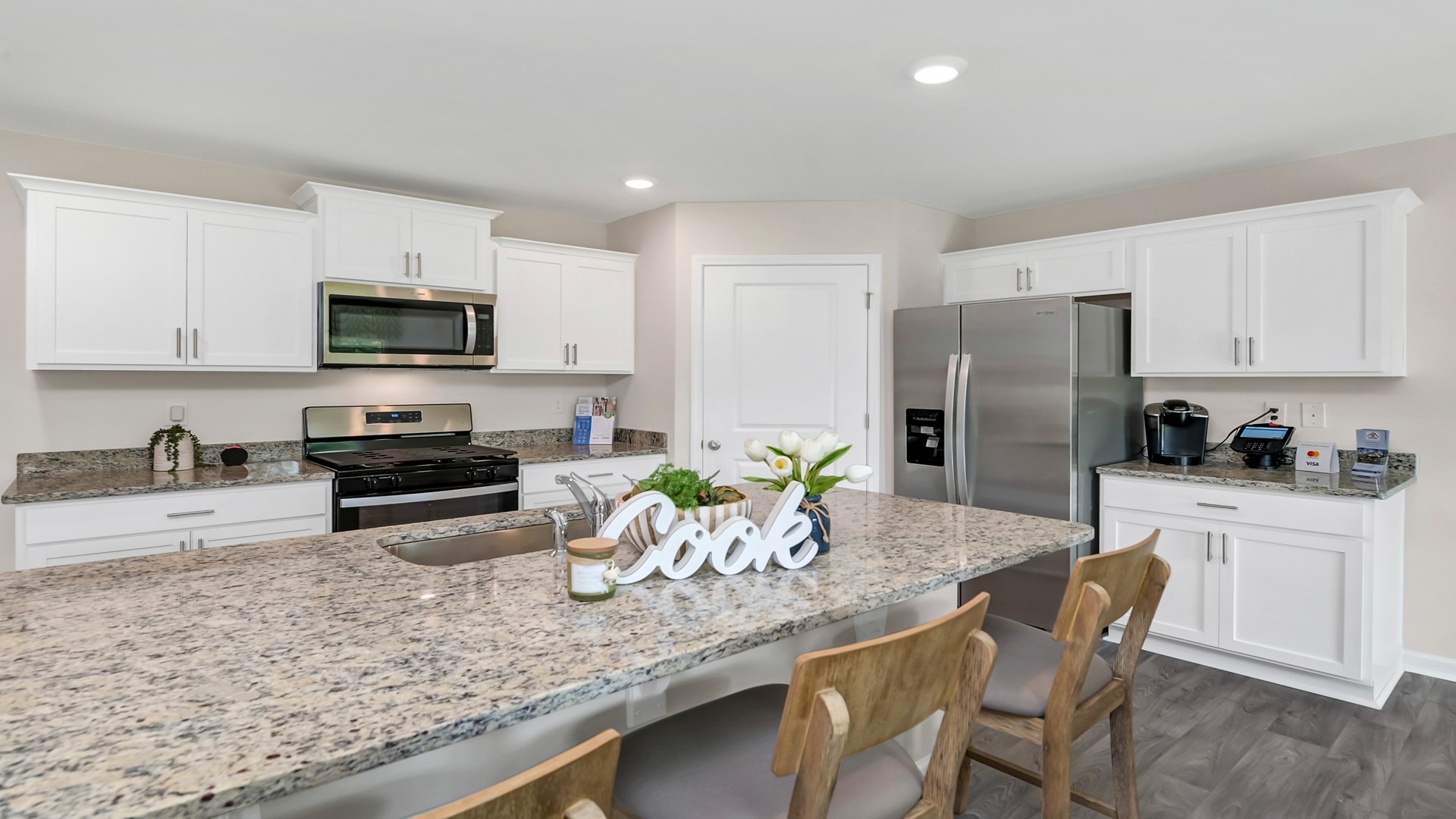Cali Kitchen with white cabinetry and lots of counter space