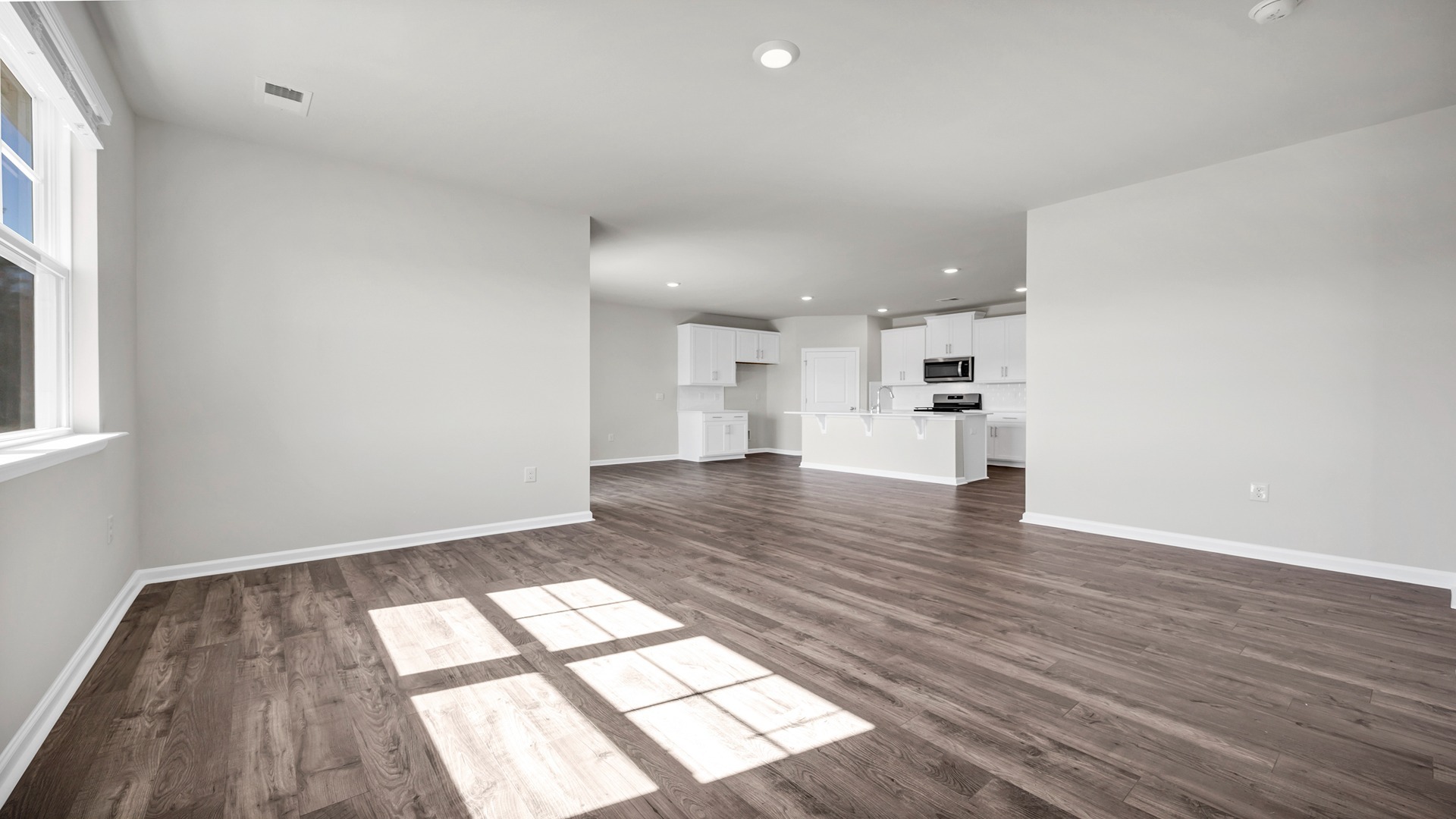 Living area with views of the kitchen space