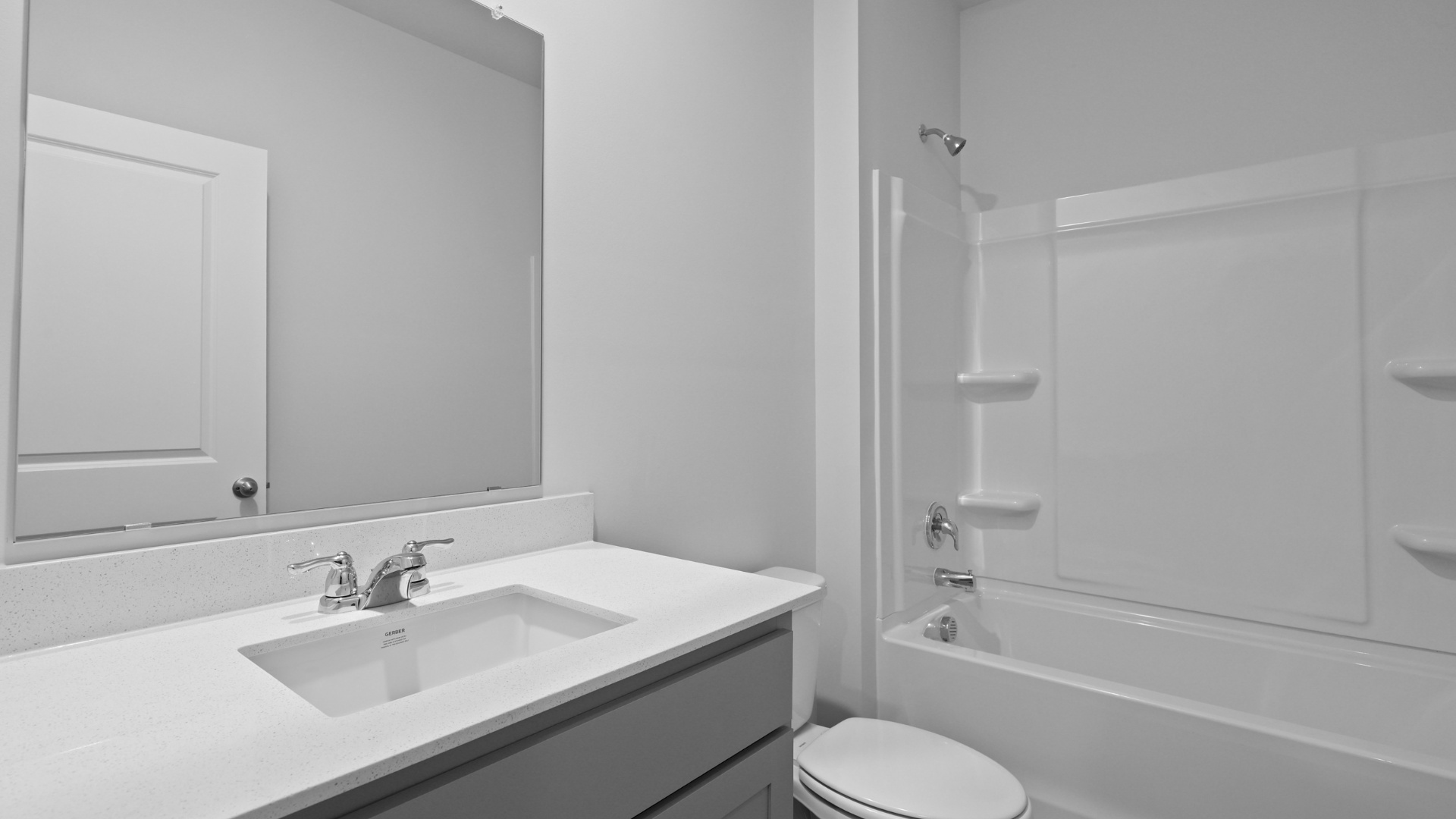 Bathroom 2 with a shower tub and quartz countertops