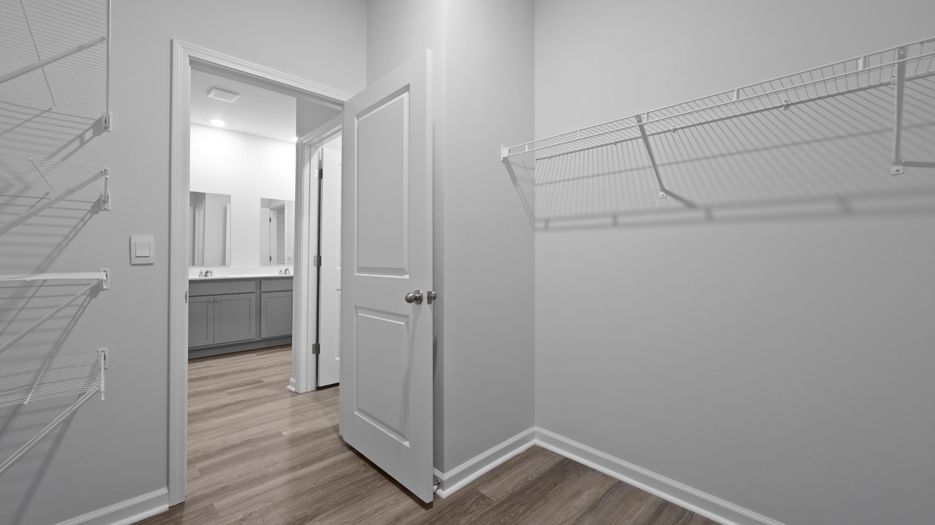 Walk-in primary closet in the Cali primary suite