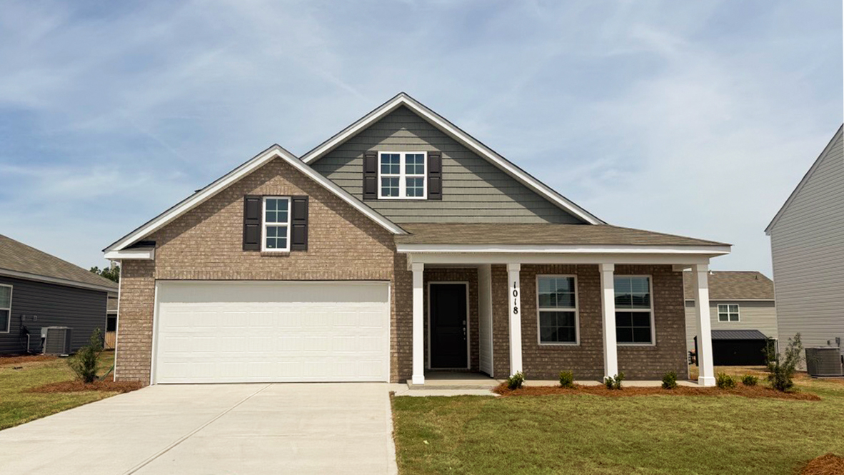 Two-story home for sale in Lugoff, SC with 4 bedrooms and a frog/loft.