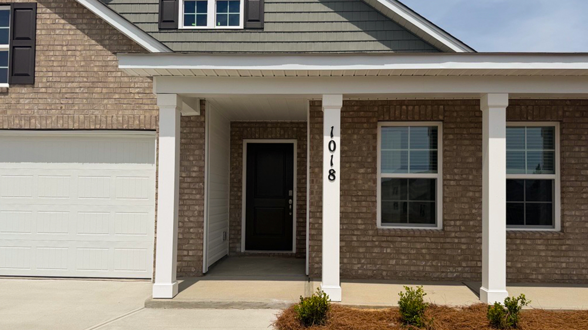Covered front porch on home for sale in Lugoff, SC.