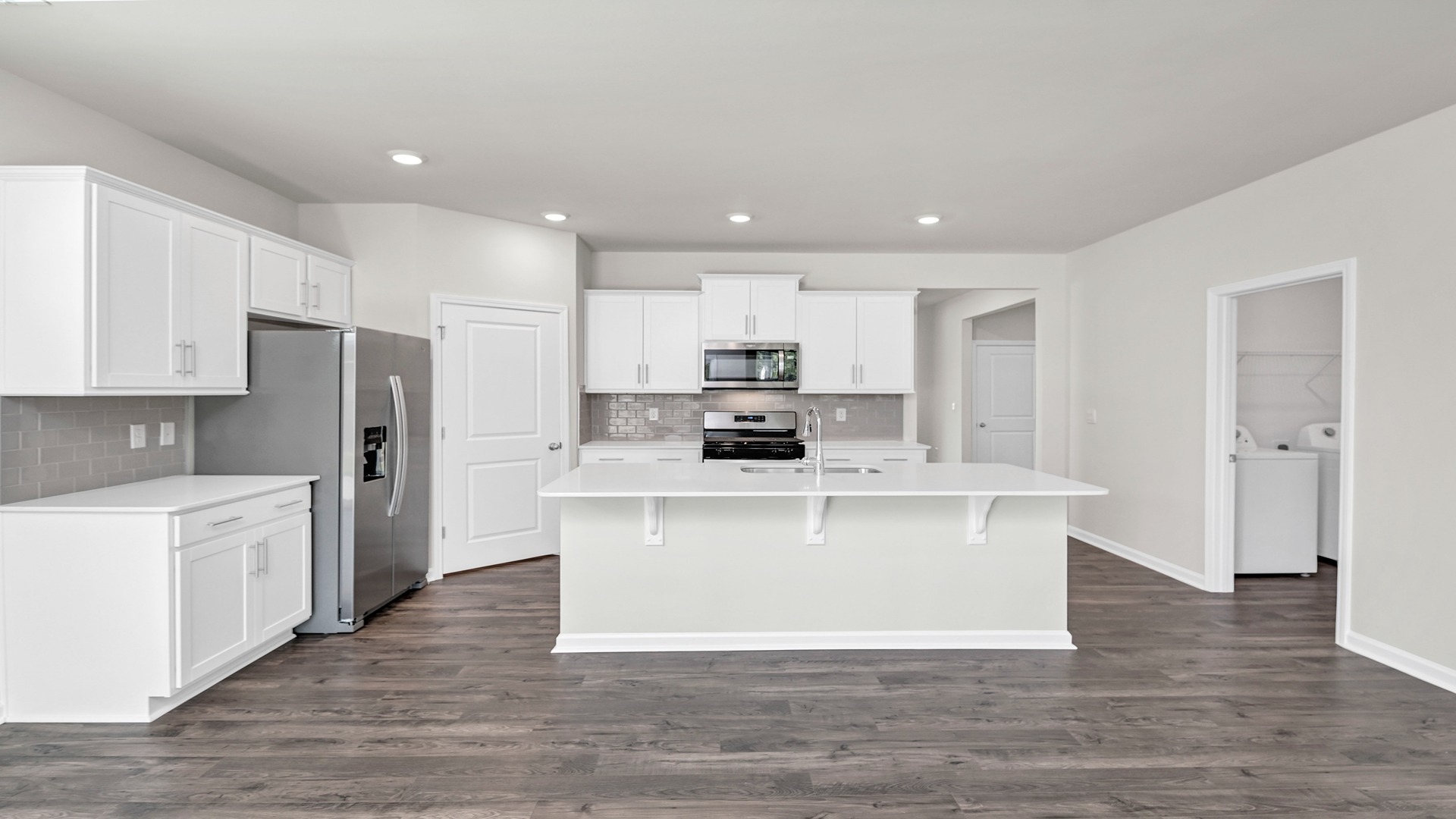 Dover kitchen with white cabintery and white quartz countertops