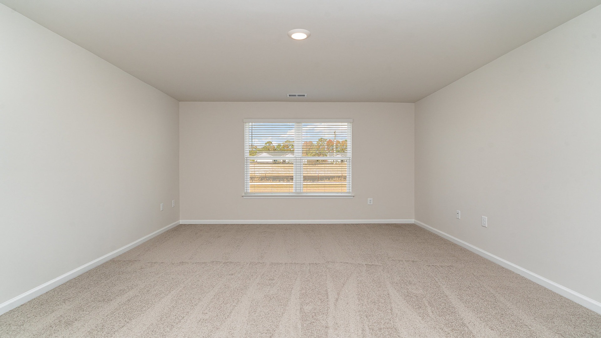 Bedroom 4 with carpet flooring