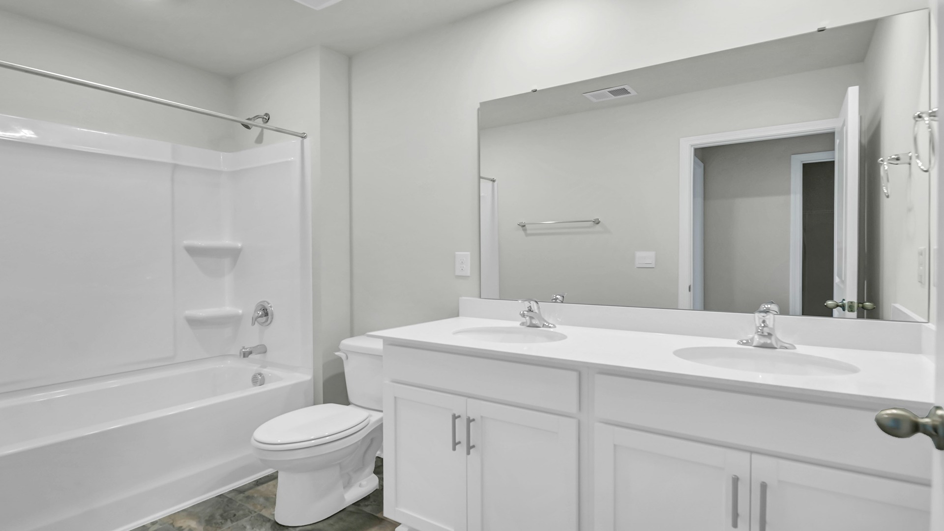Bathroom 2 with white cabinetry and double vanity
