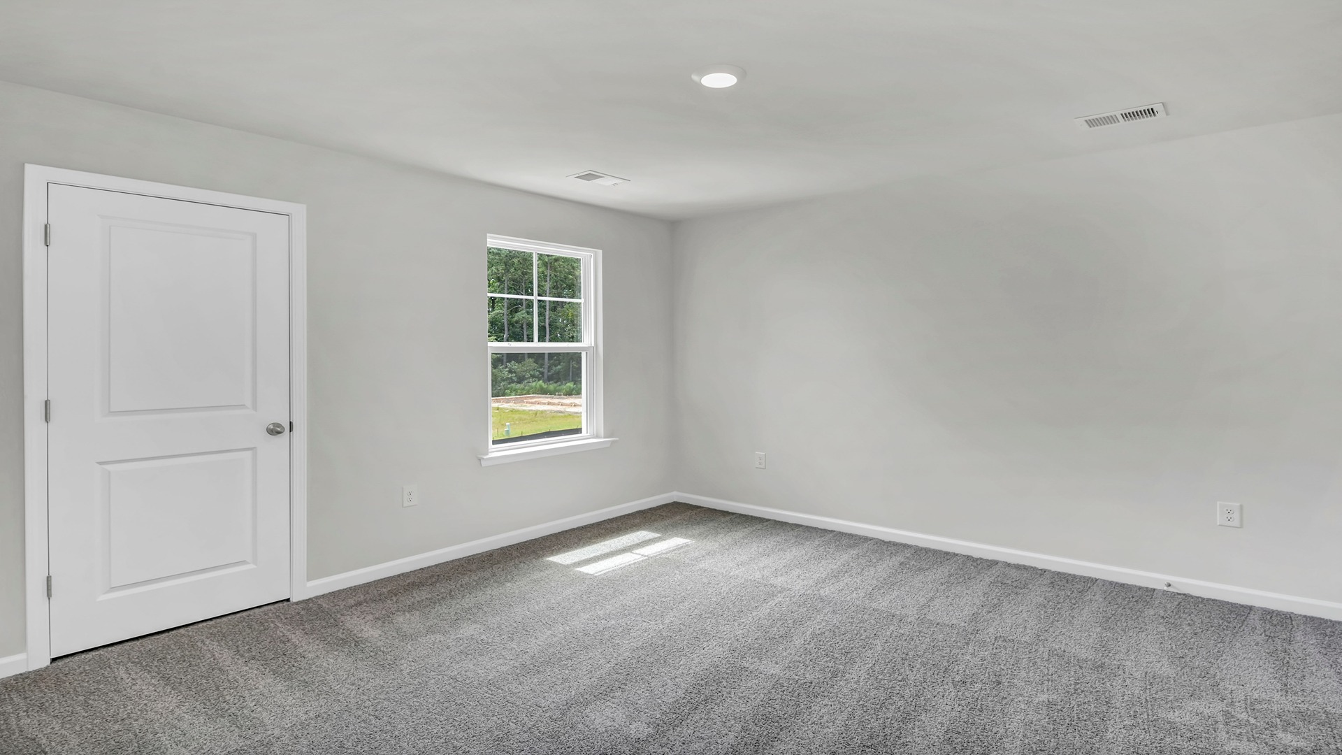 Bedroom 4 upstairs with carpet flooring and a window