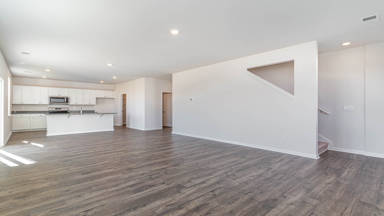 Access to upstairs is in the living area.