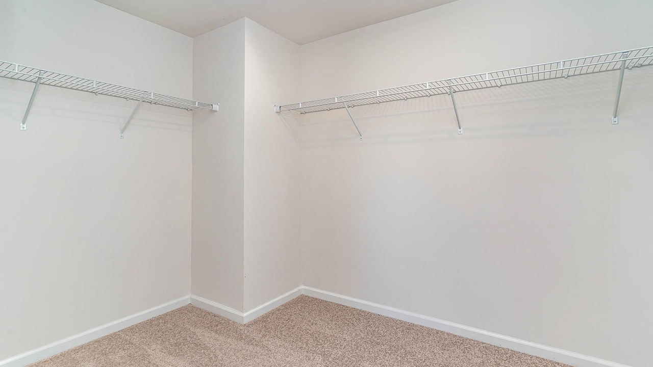 The walk-in primary closet is spacious.