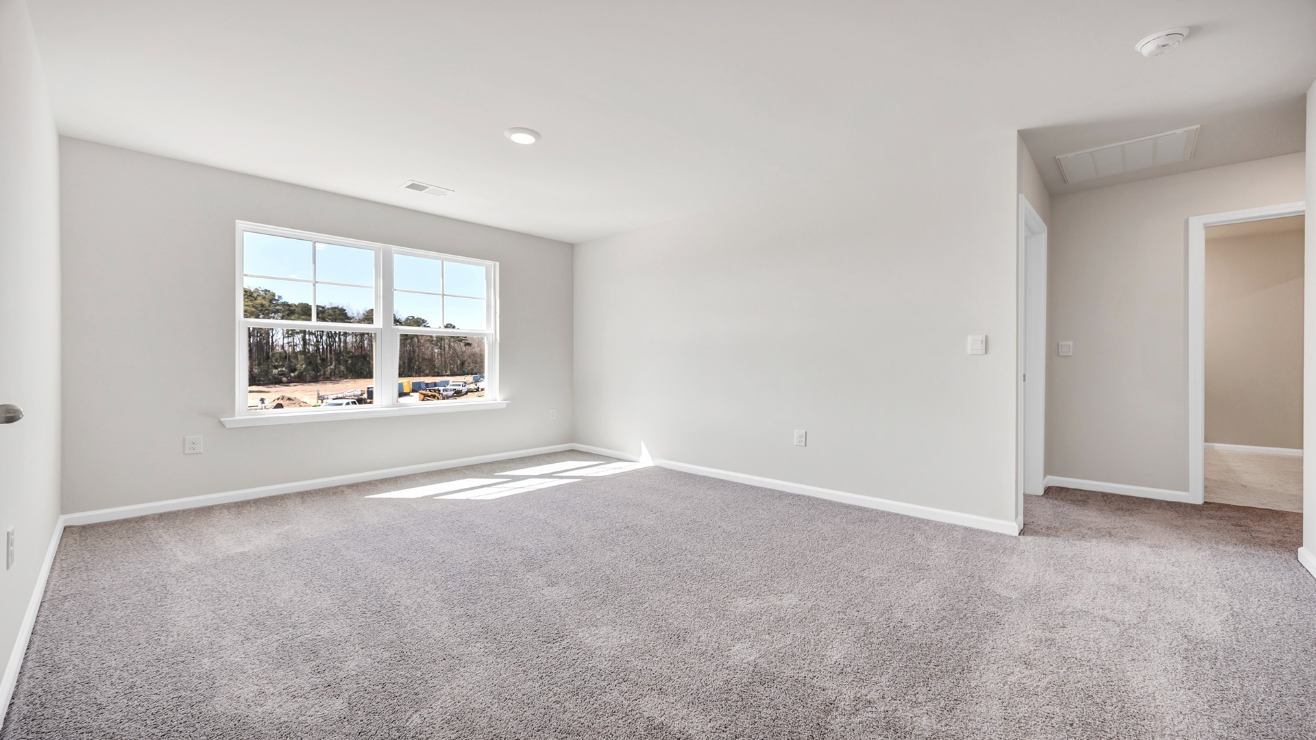 Upstairs loft space that could be a secondary living area or a game room