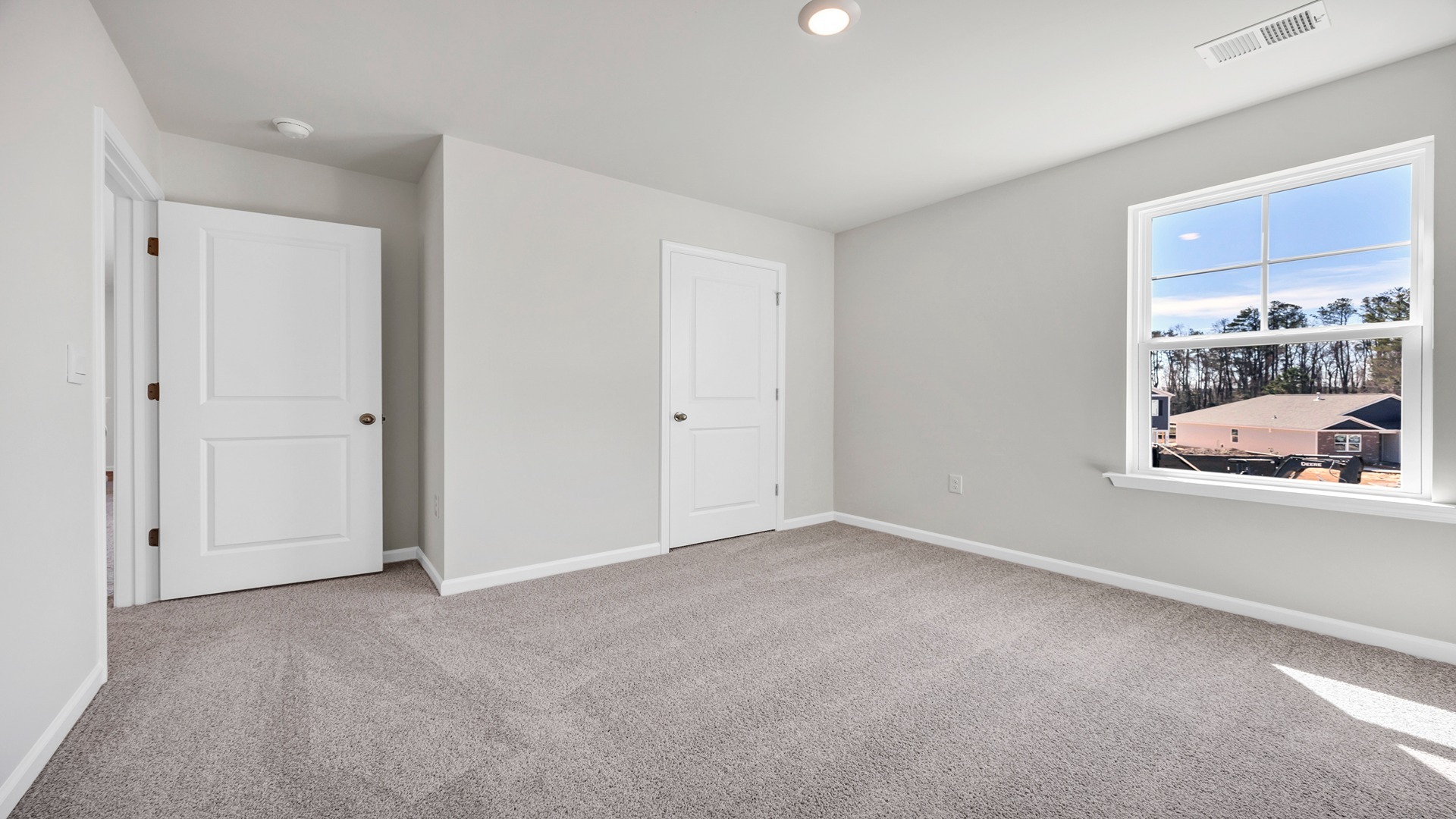 Private closet and a window in bedroom 4 upstairs in new home for sale in Gates Village