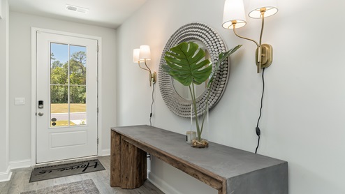 Back towards the front of the home is the foyer and flex space.