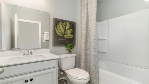 Bathroom 2 is located downstairs.