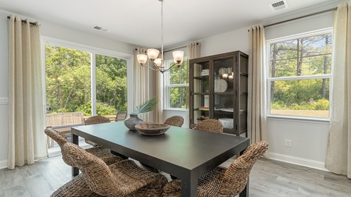 The casual dining area is near the kitchen space.