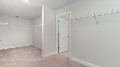 The primary closet is very spacious.
