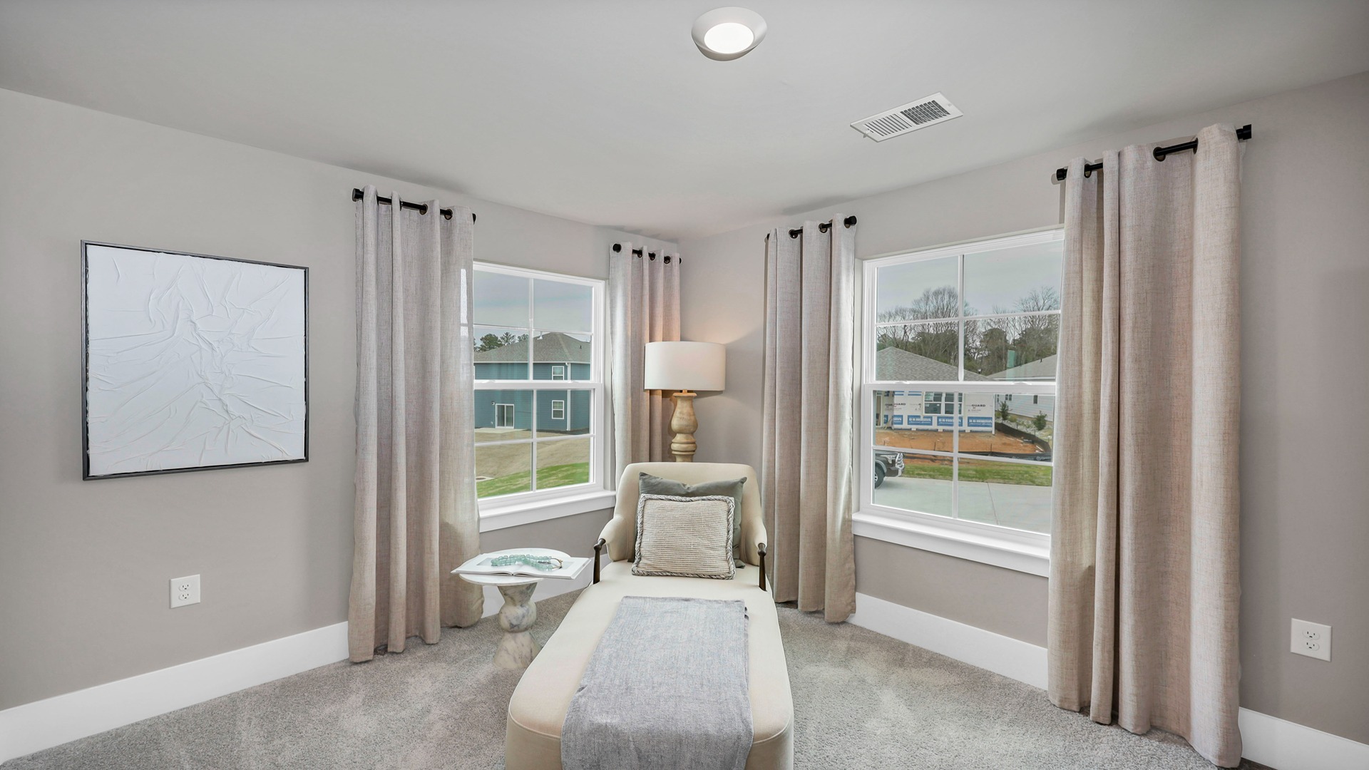 Several windows in the primary sitting room