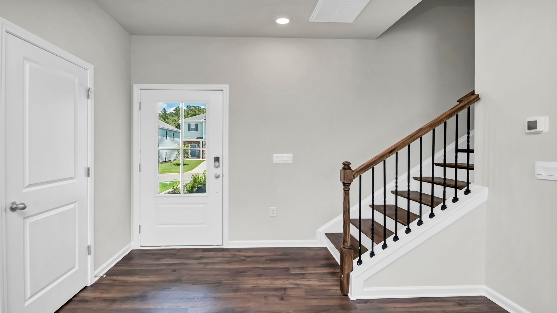 Front entrance and stairway to upstairs