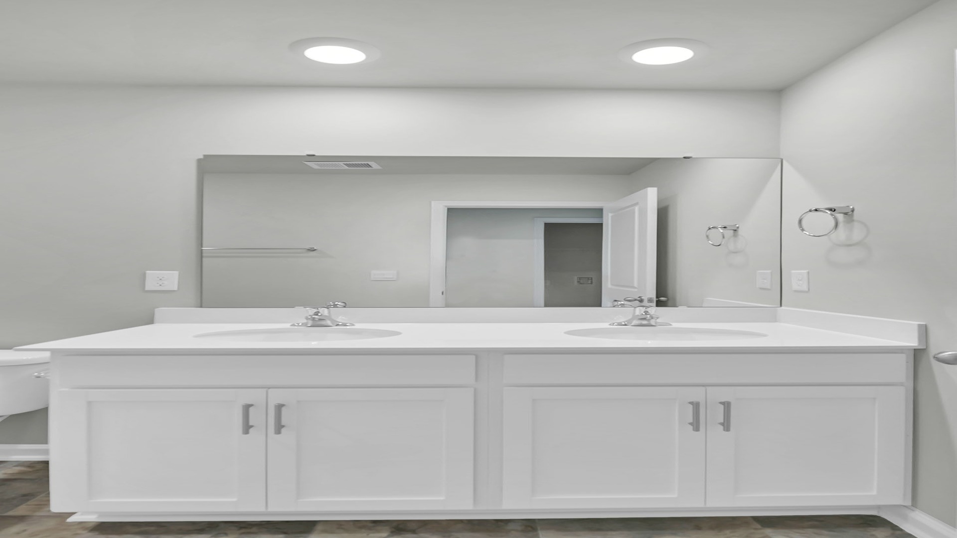 Bathroom 2 upstairs features double sinks and a shower/tub combo.