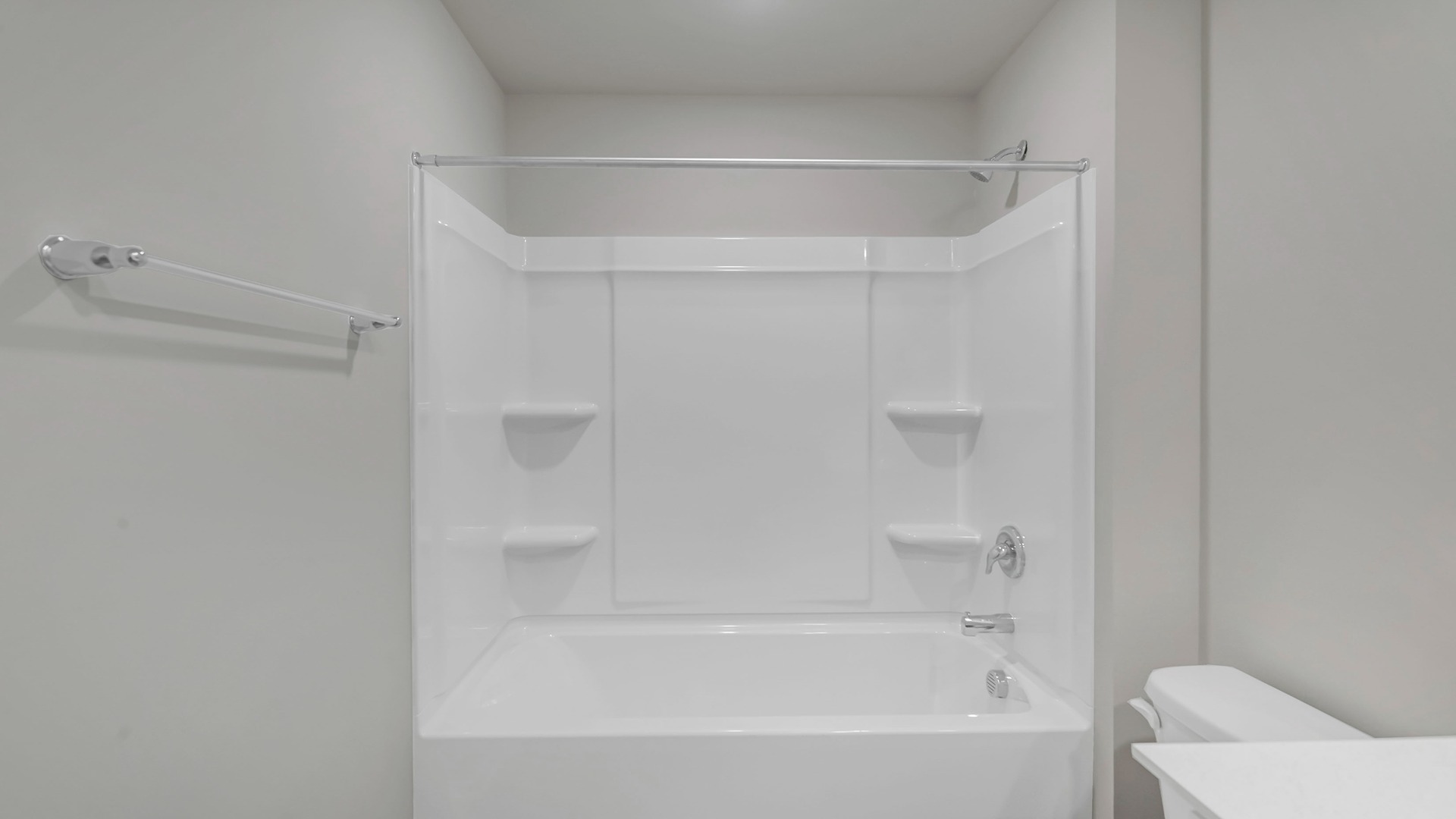 Bathroom 2 upstairs features double sinks and a shower/tub combo.