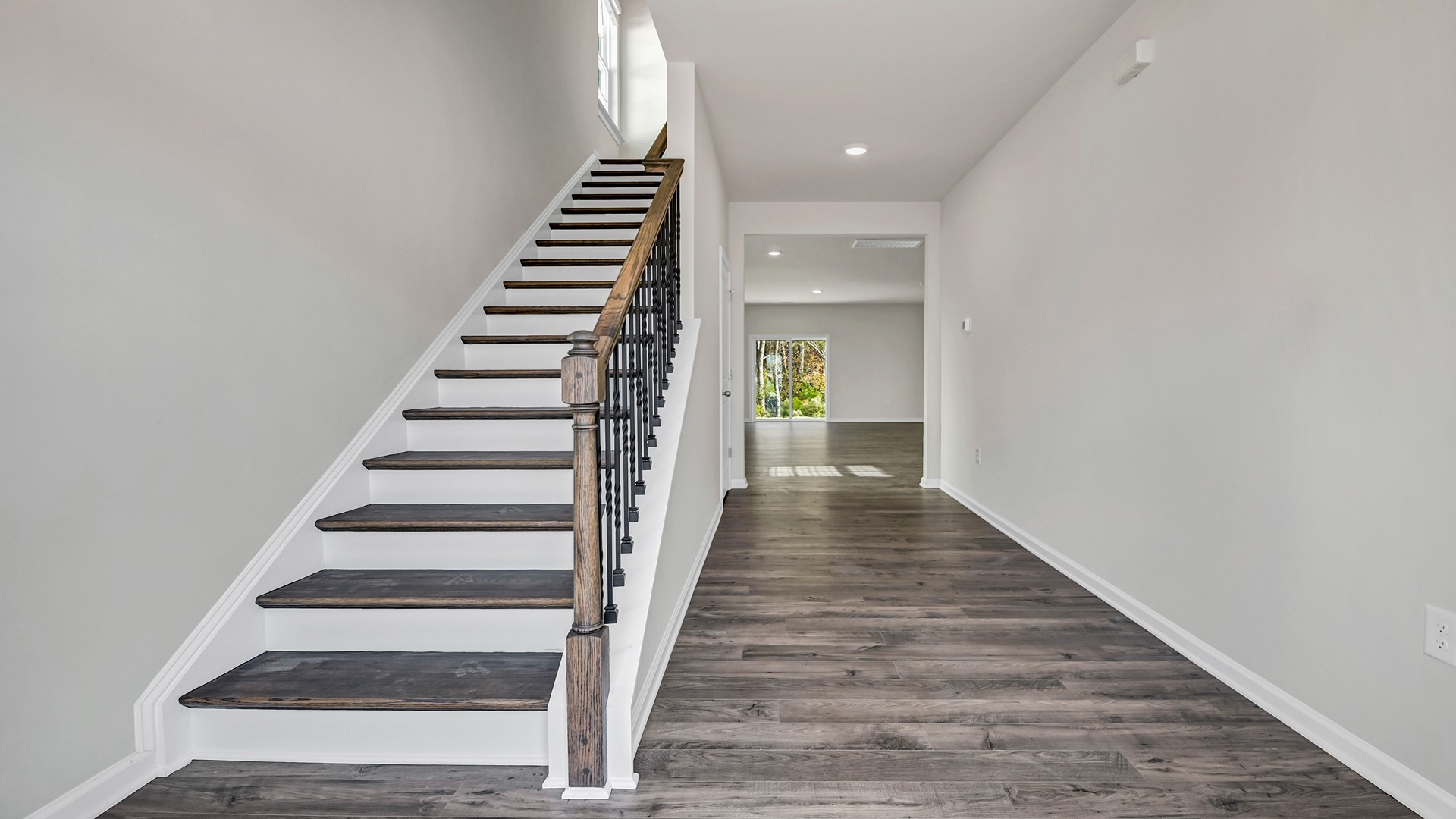 Access to upstairs in the front foyer