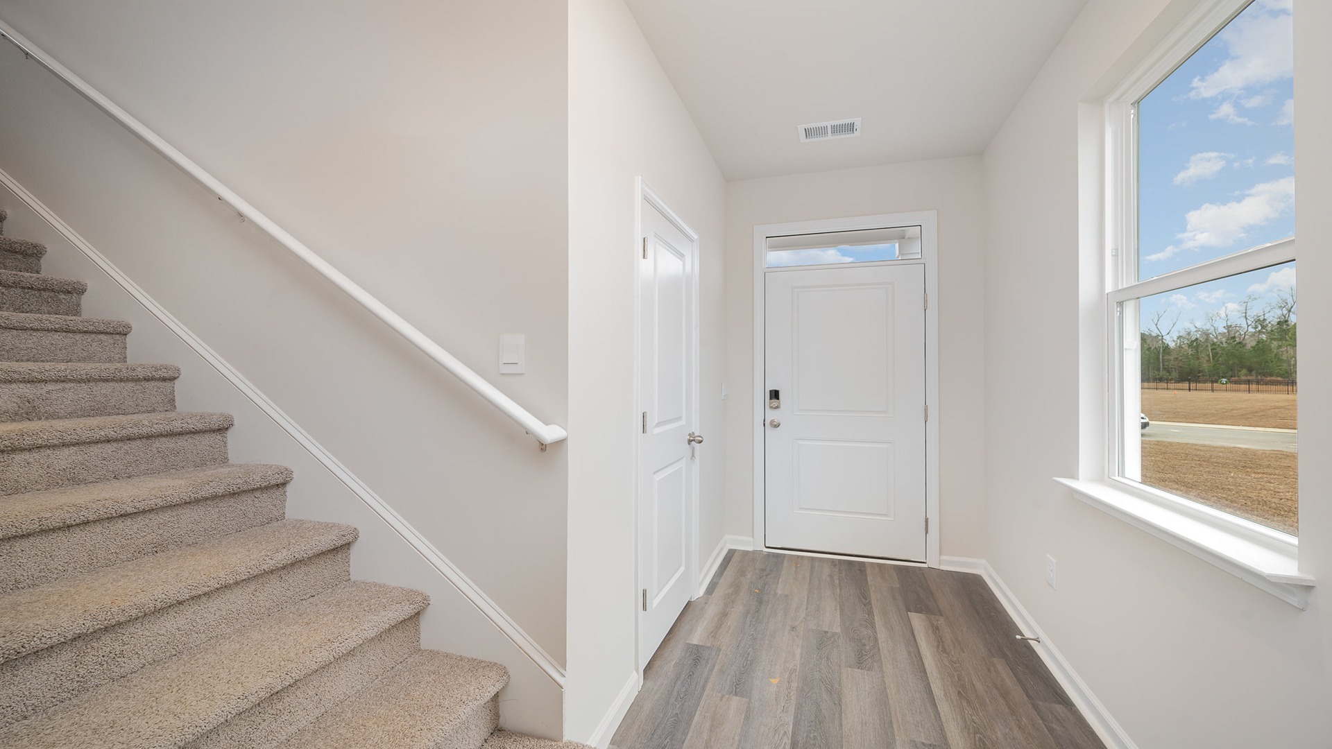 Front foyer and stairway to upstairs
