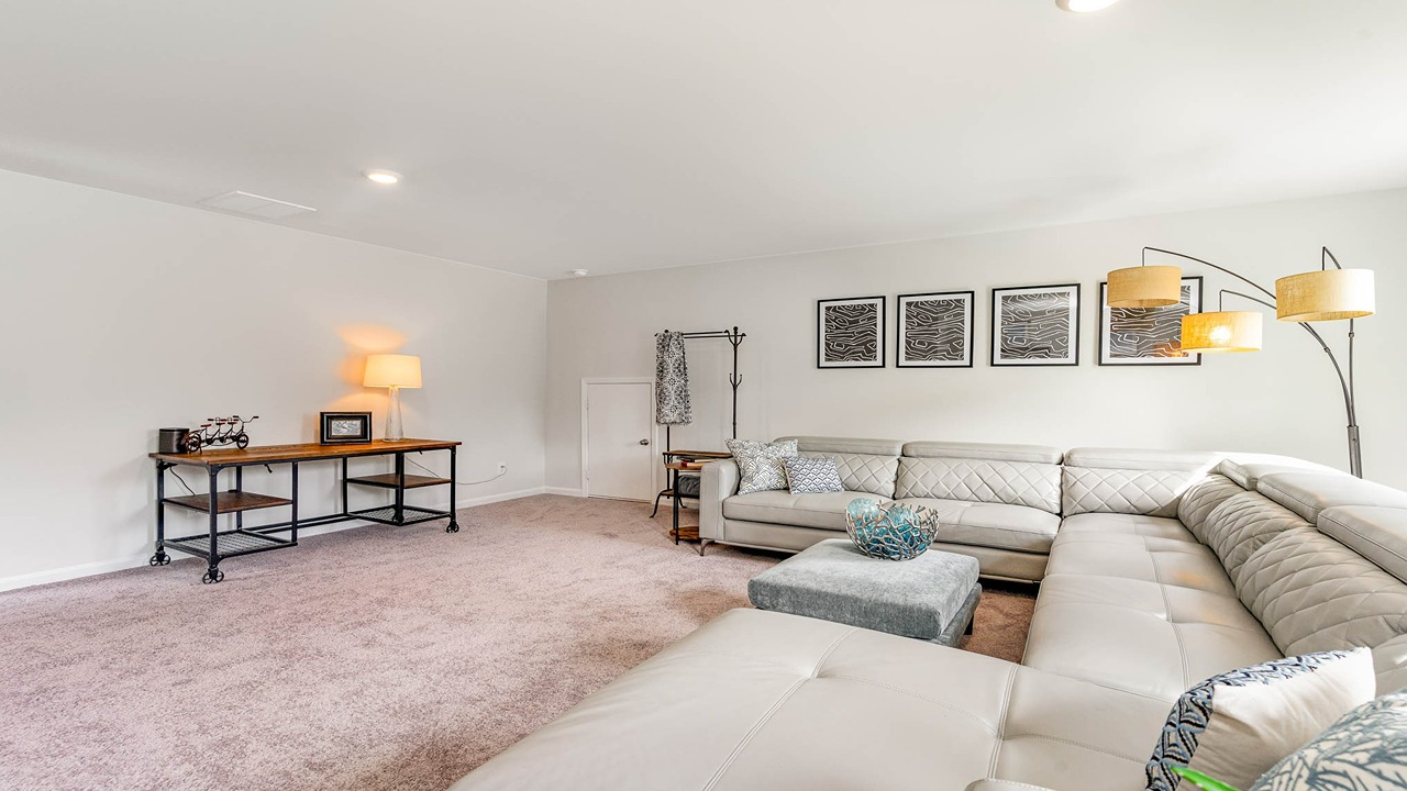 There is a bonus room upstairs that could be used as a game room or additional bedroom.