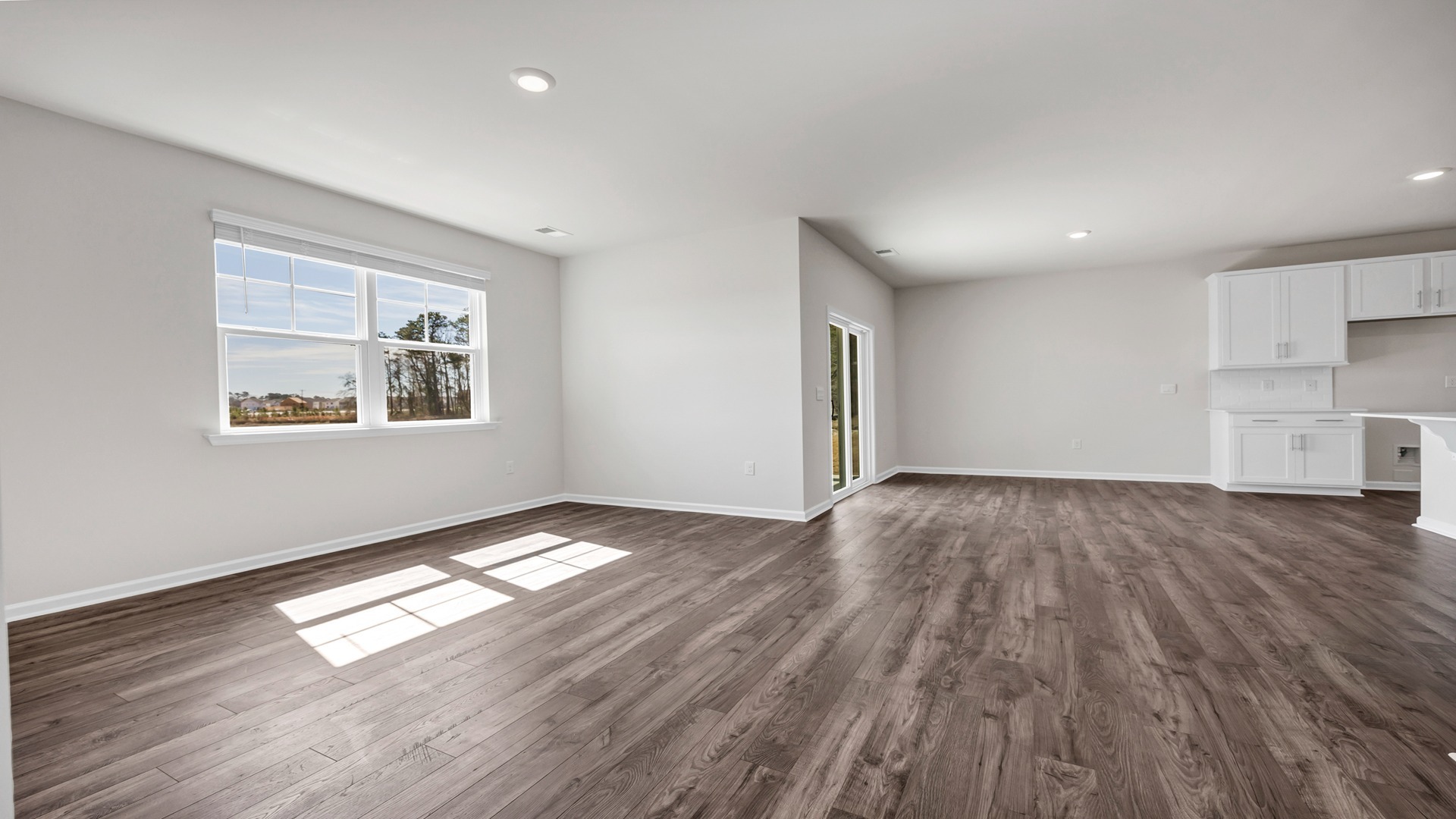 Open concept dining and living areas in new construction home for sale in Irmo, Sc