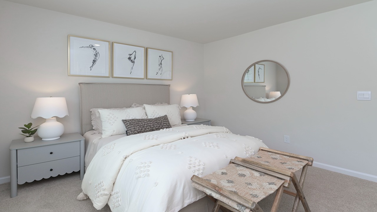 Bedroom 3 with large window and carpet floors