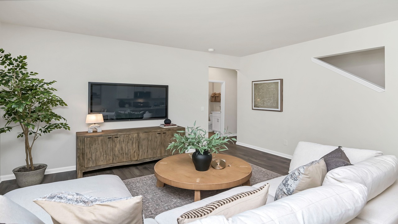 Living area leads to downstairs bedroom