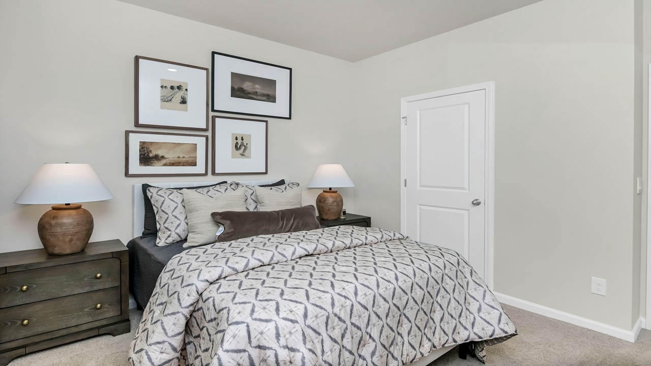 Downstairs bedroom with a private closet