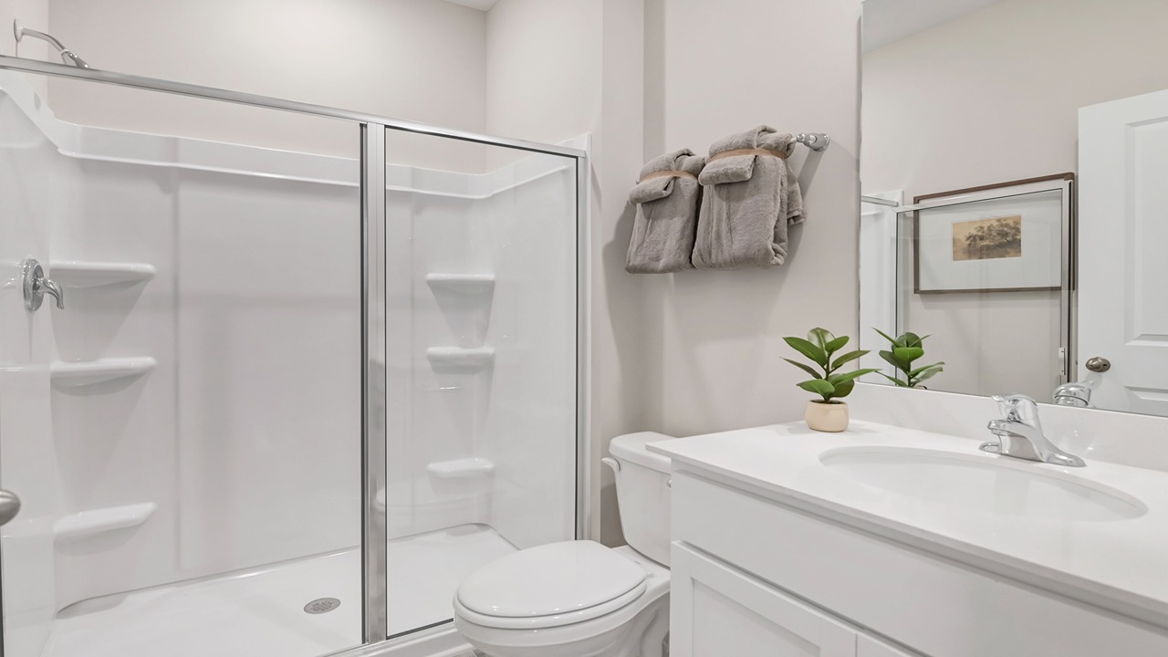 Downstairs full bathroom with a standup shower