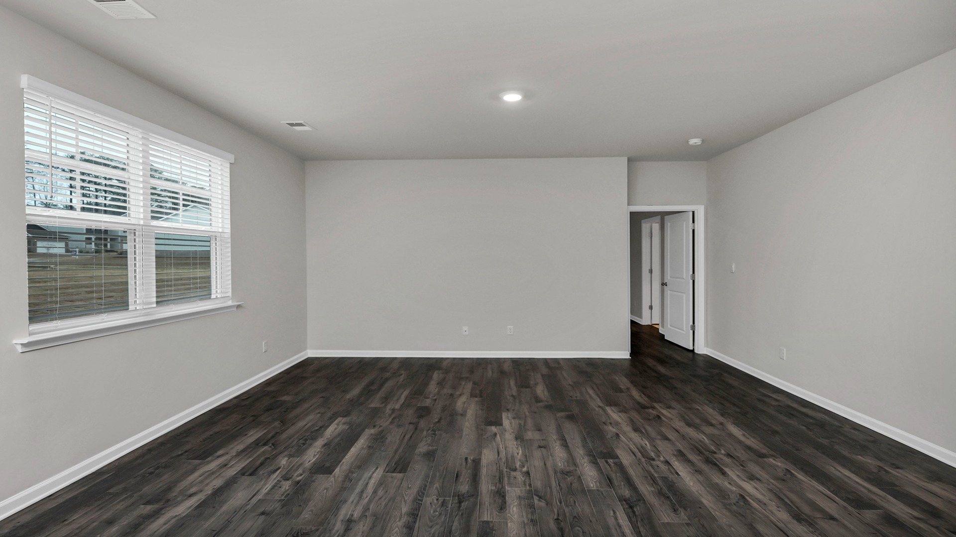 Primary suite downstairs in the Elle floorplan in Livingston Woods
