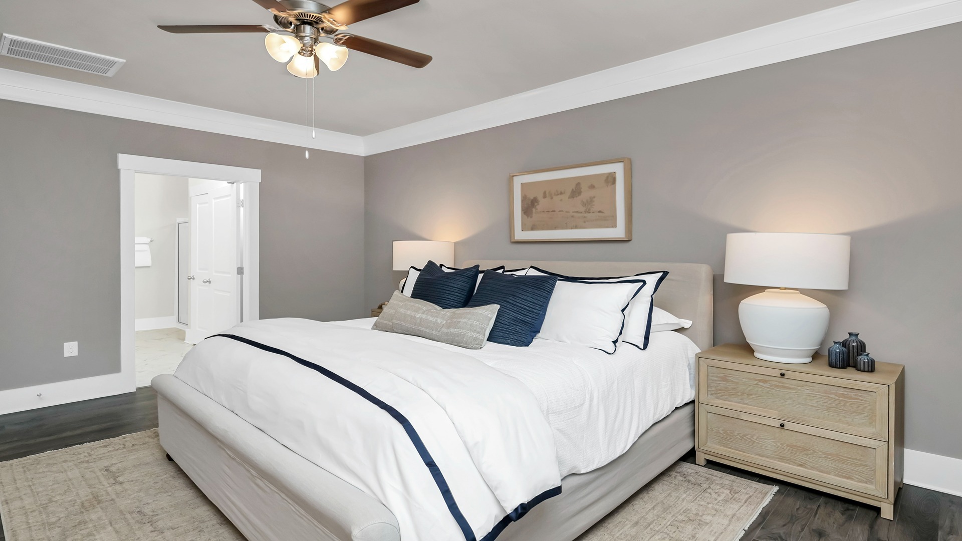 Primary bedroom with tray ceilings