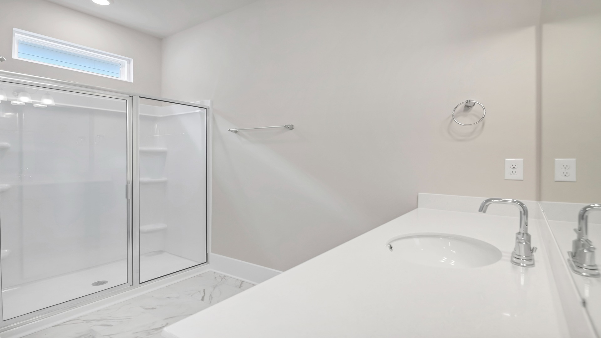 Standup tile shower in primary bathroom