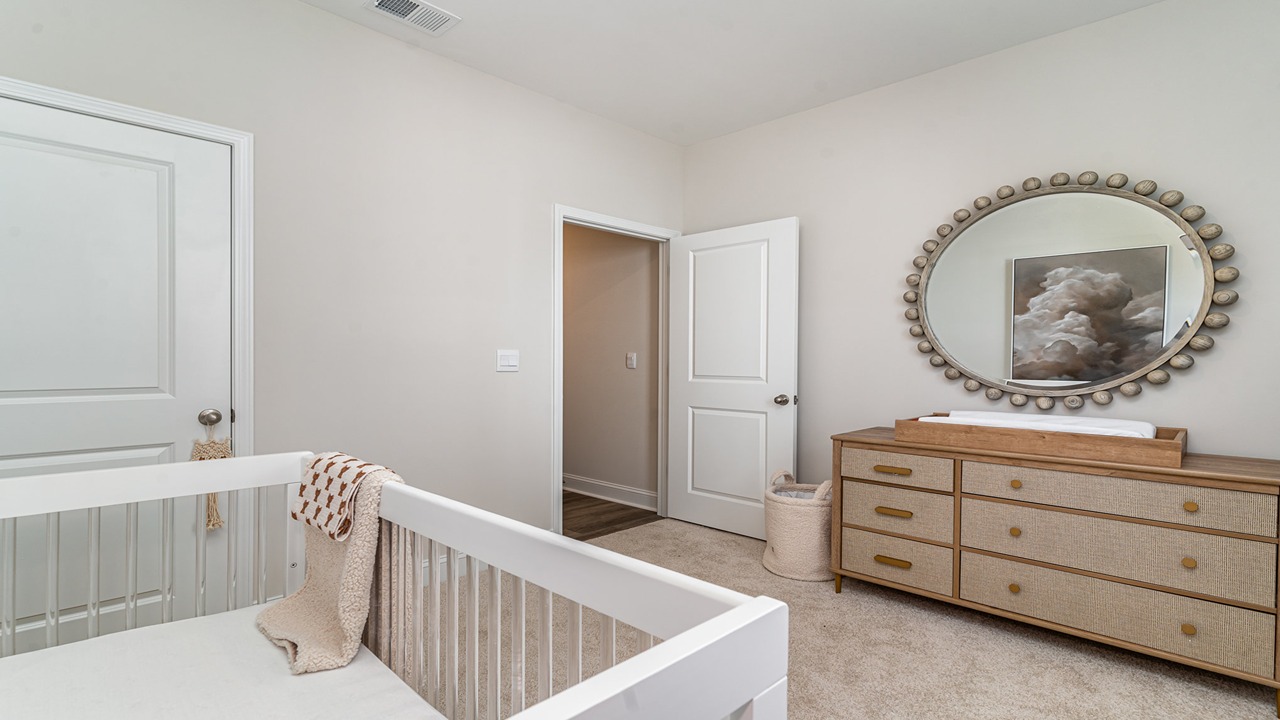 Bedroom 3 staged as a nursey.