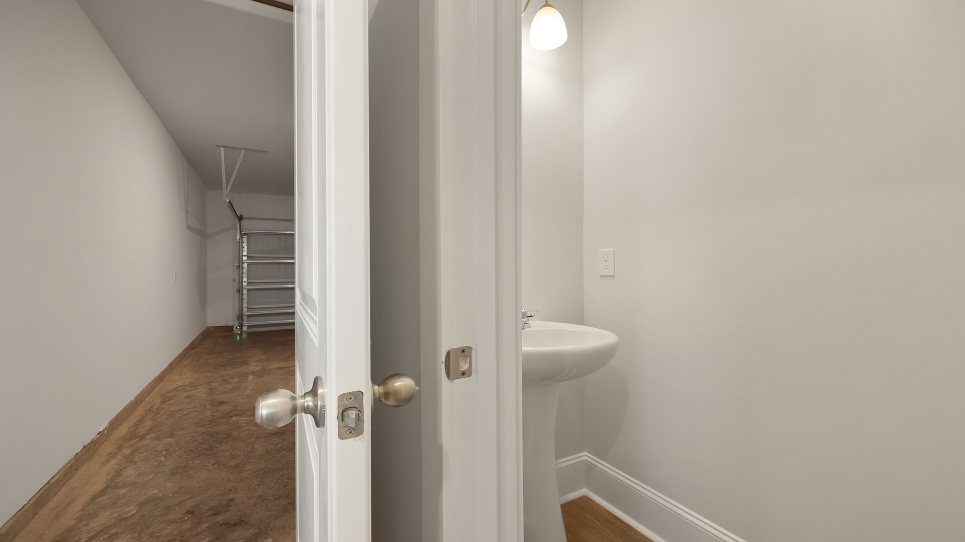 Downstairs powder room and garage access