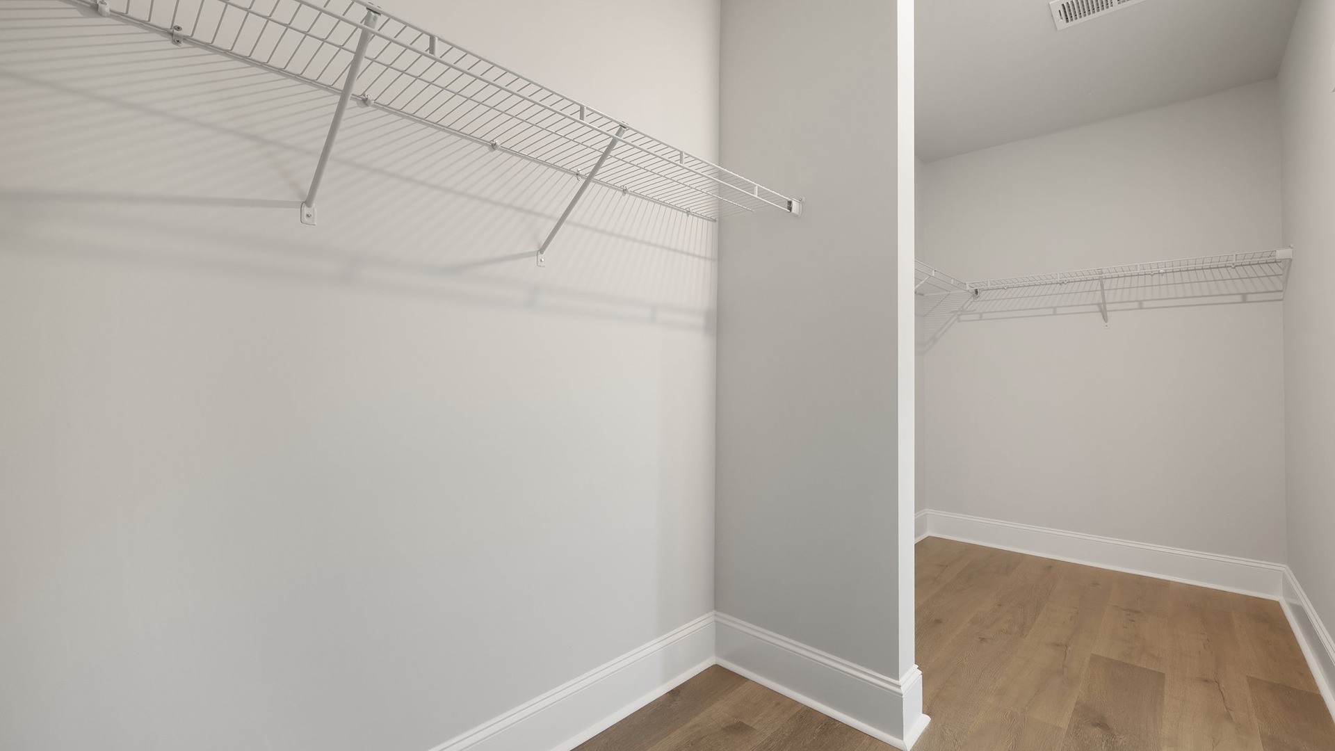 Very large walk-in primary closet