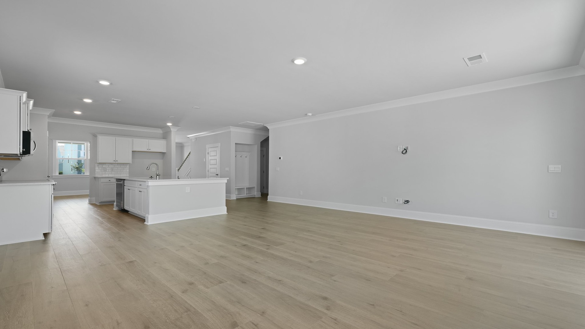 Durable RevWood flooring throughout first floor