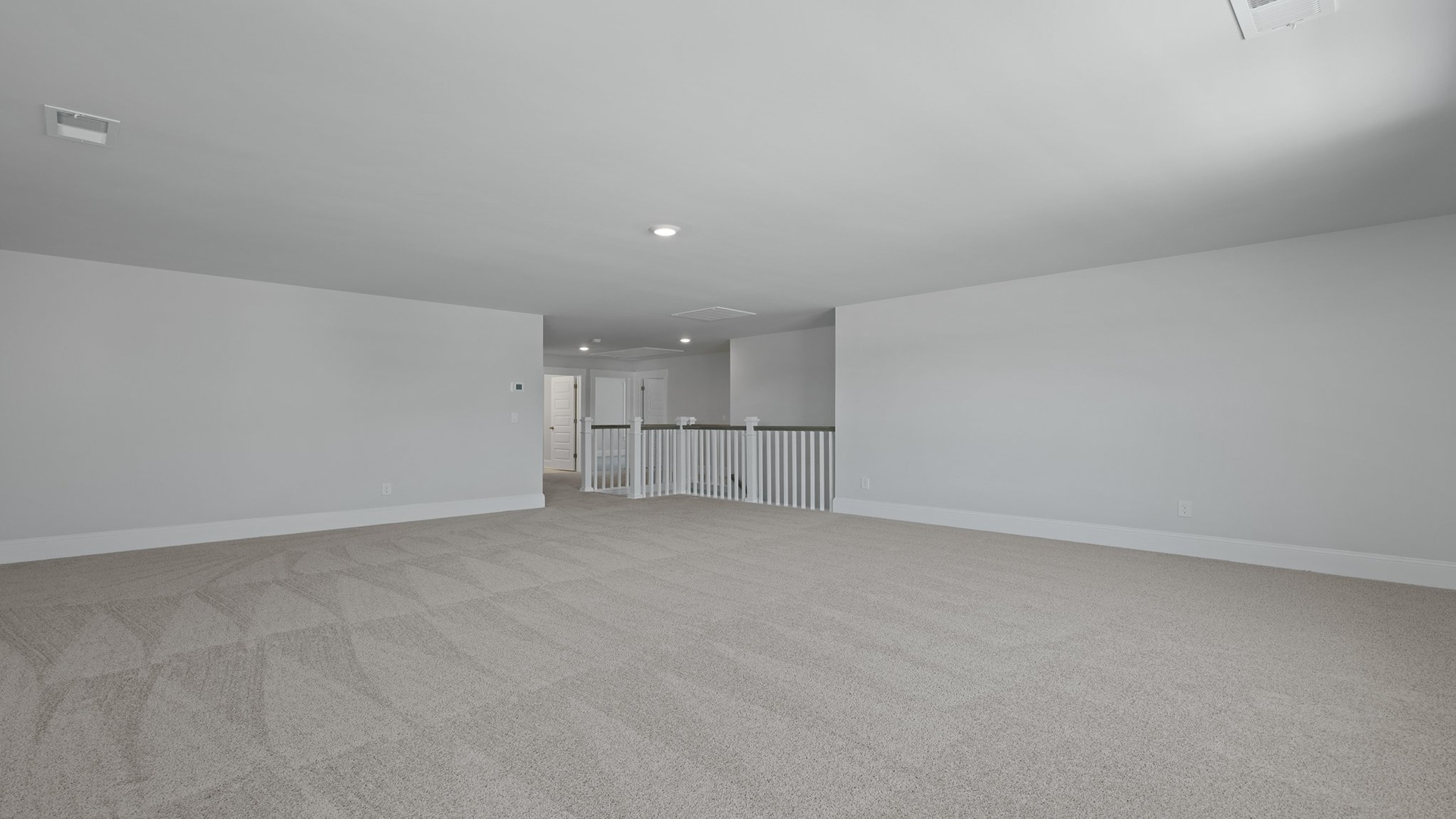Carpet flooring in large loft space
