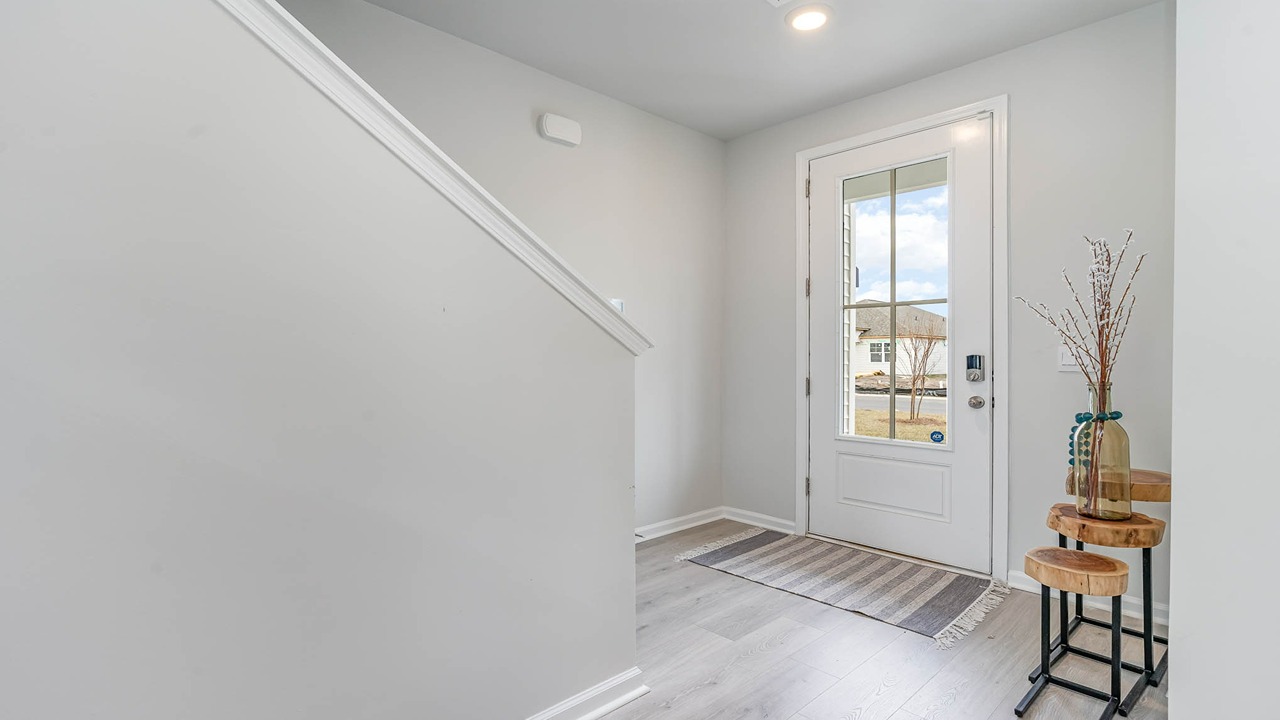 Front foyer with stairway to upstairs