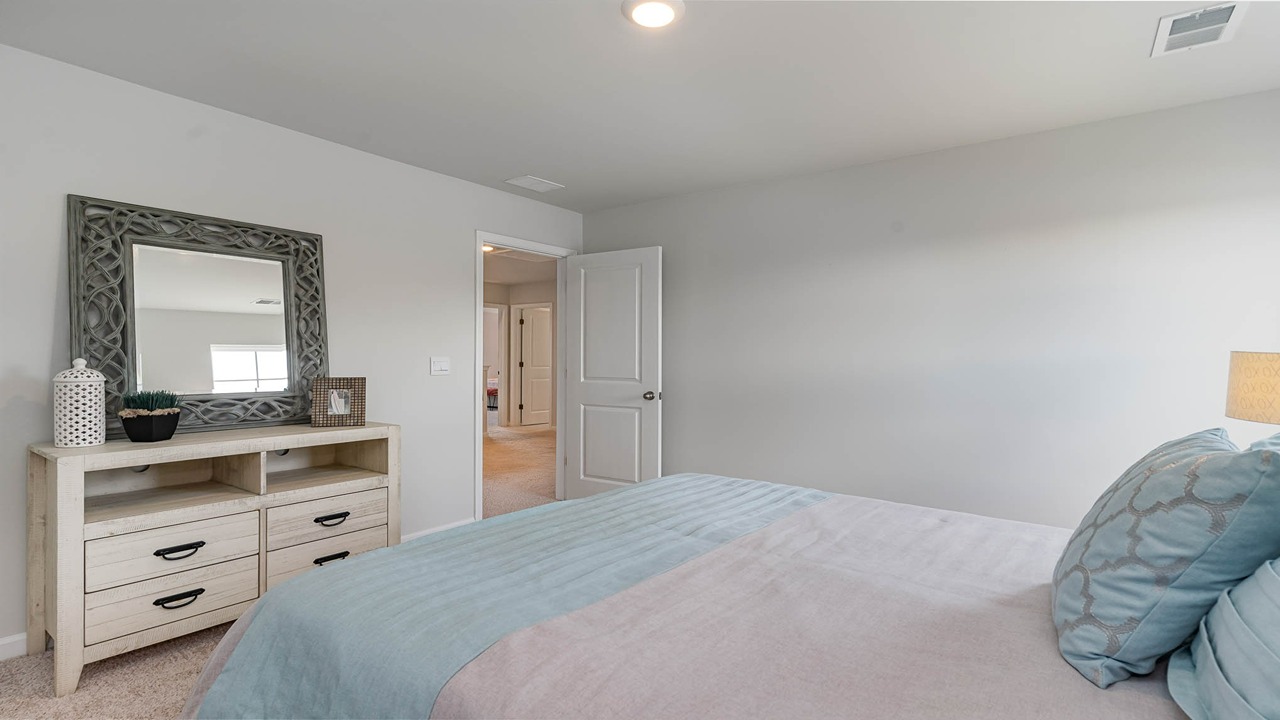 Bedroom 4 upstairs with a walk-in closet