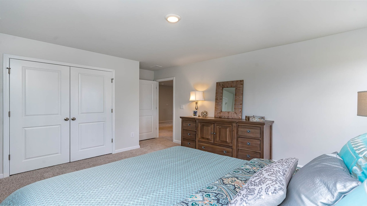 Bedroom 3 upstairs with French closet doors
