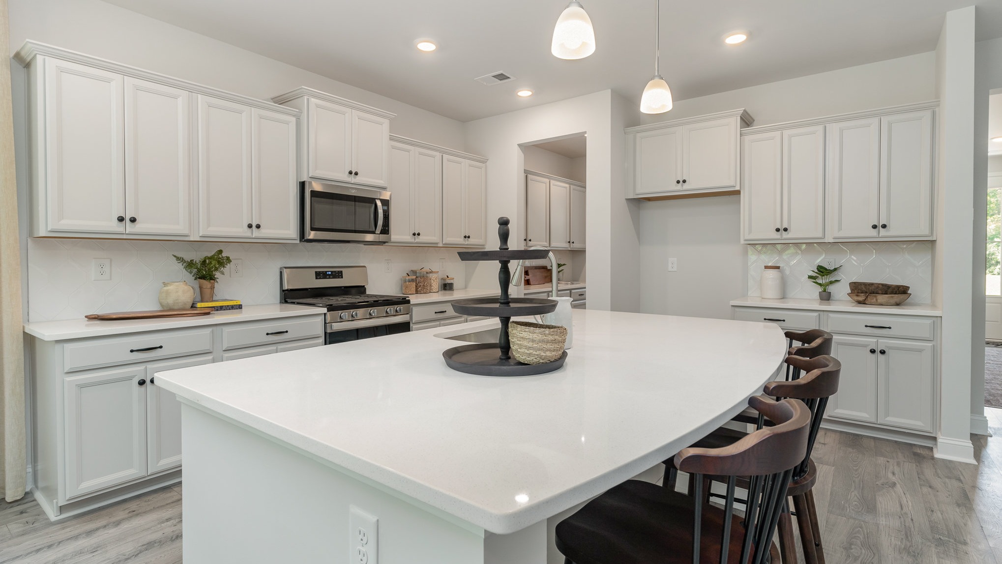 There is room for barstool seating at the floating kitchen island.