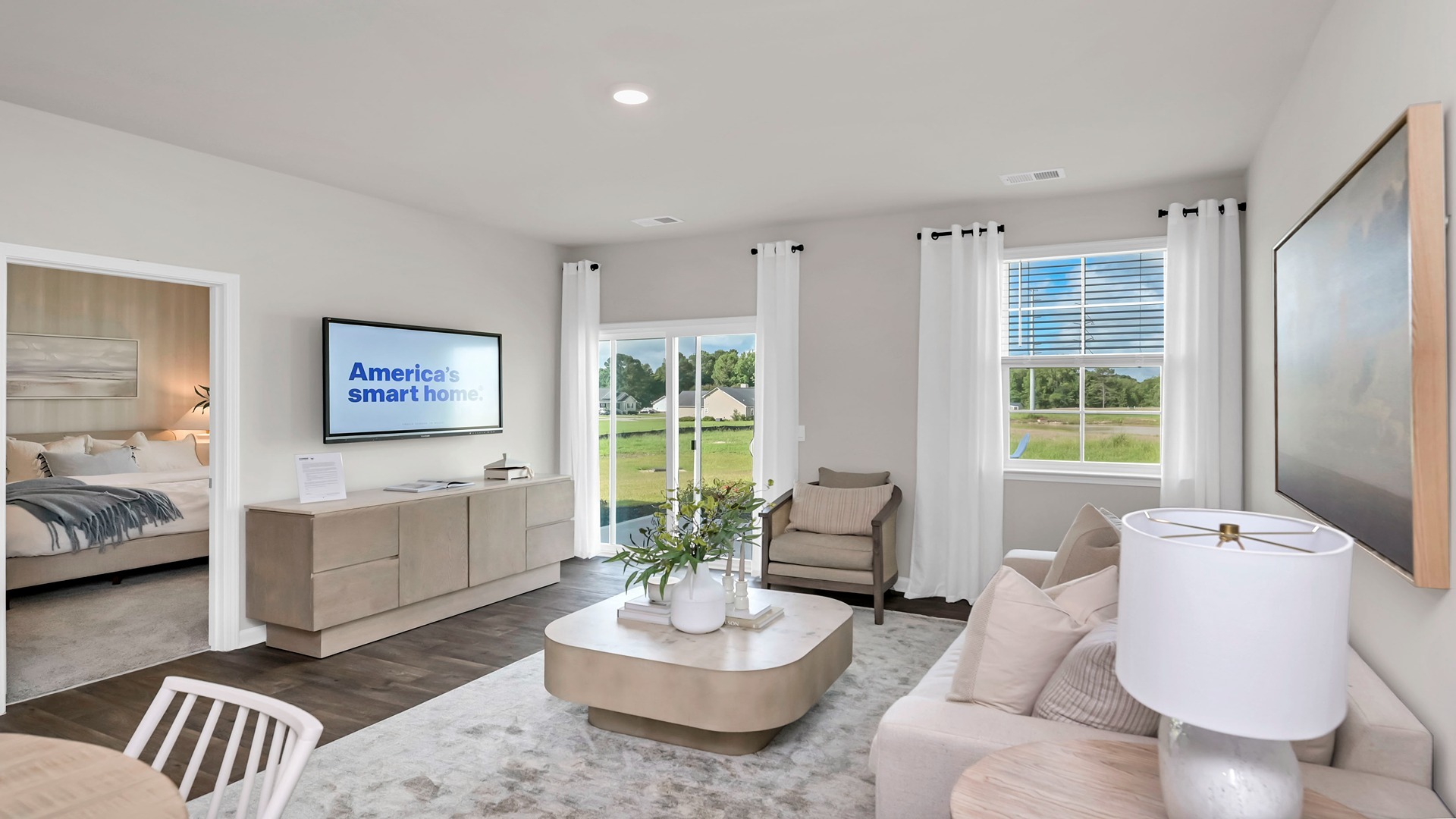 Living area leads into primary bedroom
