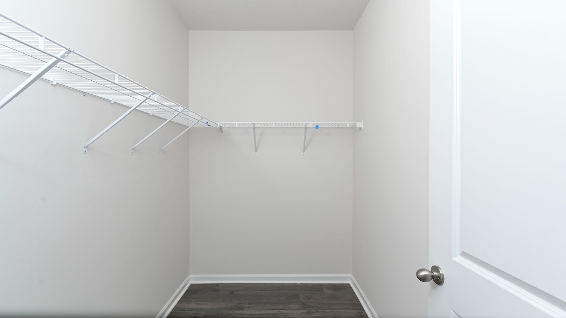Walk-in primary closet in the Allex floorplan