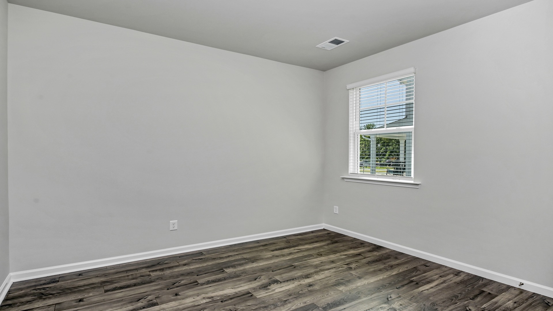 Bedroom 3 with a window for light and private closet