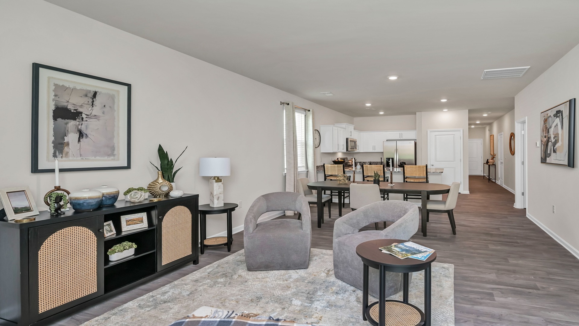 Main areas are open concept with matching vinyl floors