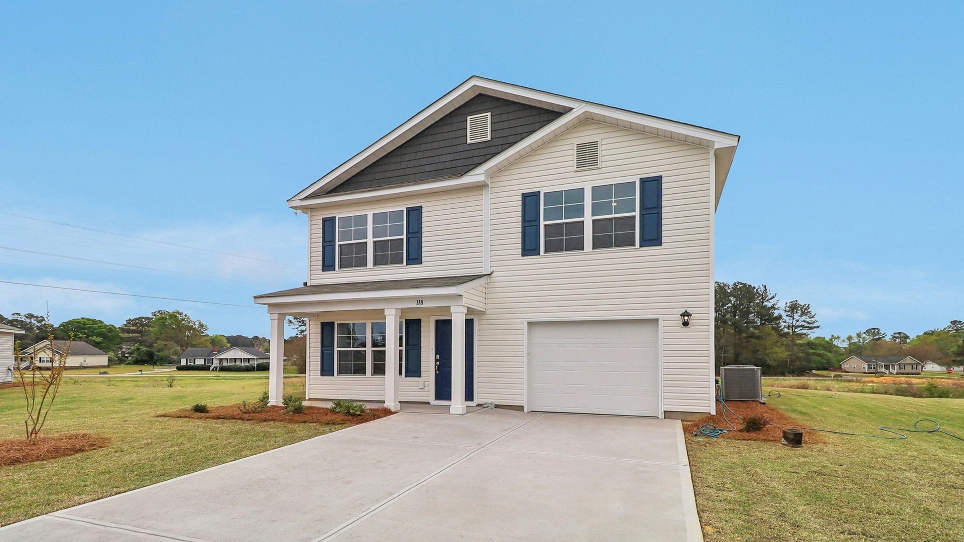 Two-story home with a covered front porch